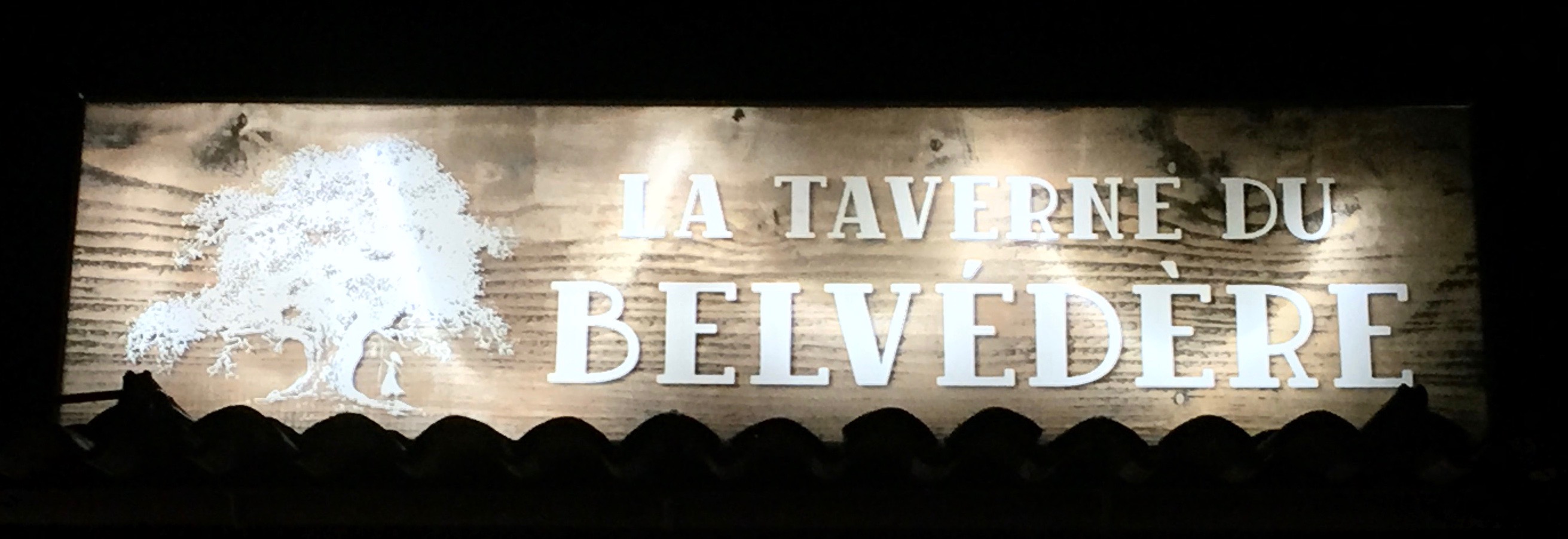 Taverne sign at night